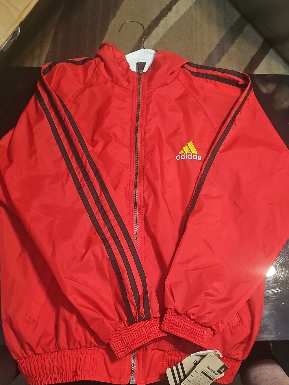 adidas Red Jacket with Black Stripe Accents and Yellow Logo